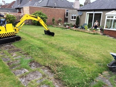 Garden leveled and new turf layed by JDS Gardening services, click here for an online turfing quote in Edinburgh